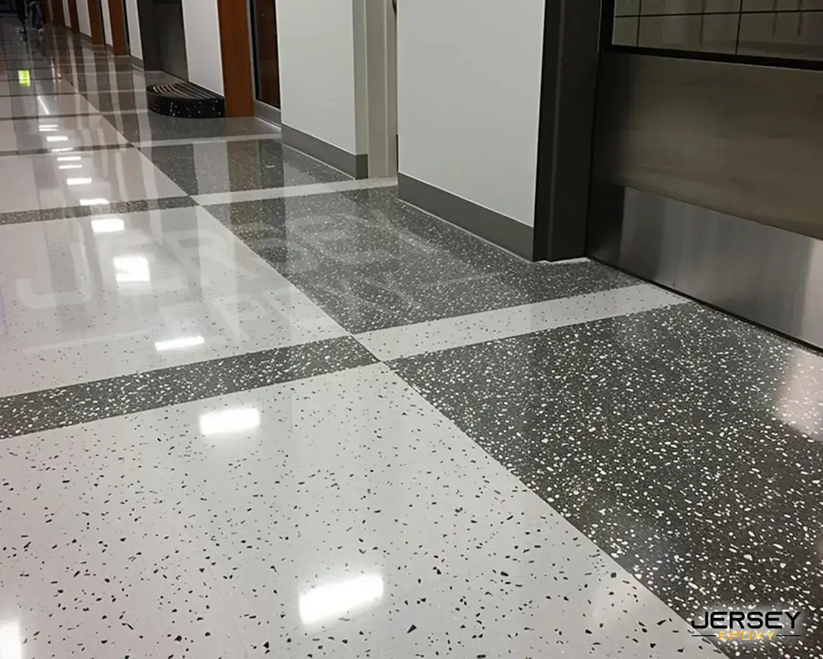Polished epoxy flooring with glamorous terrazzo pattern in commercial or residential space.