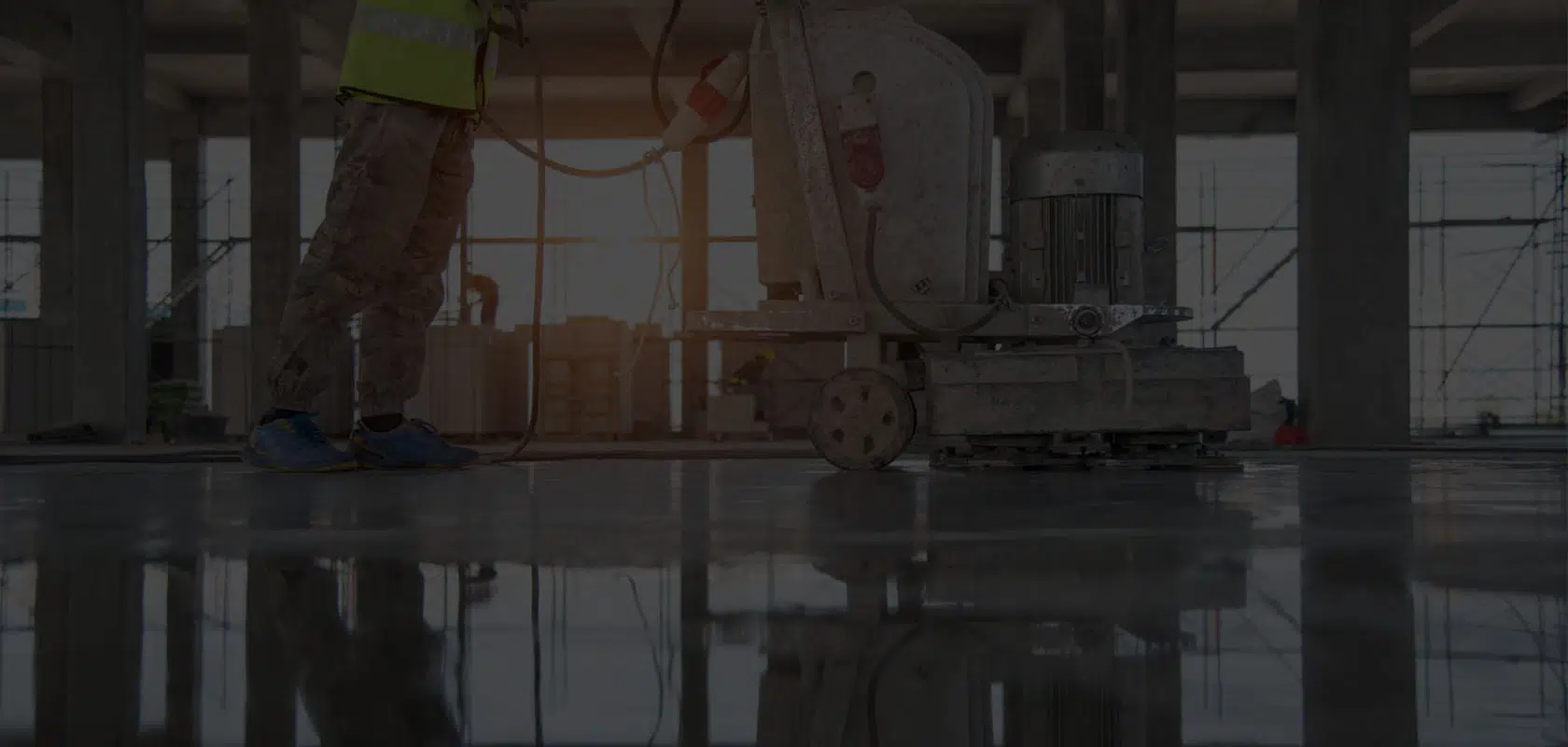 High-quality epoxy flooring installation at construction site for durable, smooth concrete floors.