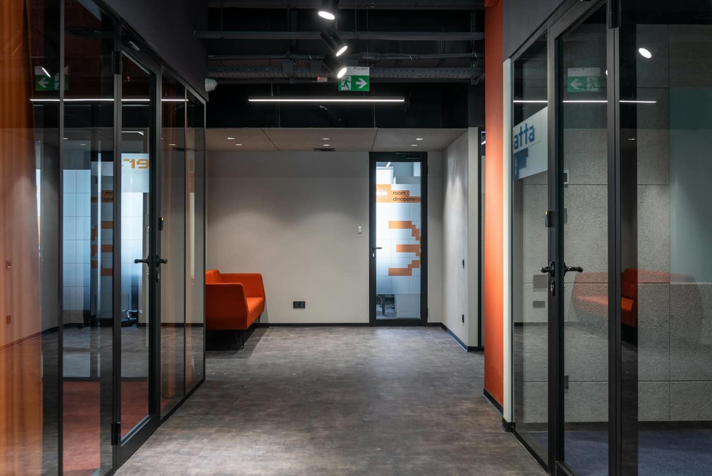 Seamless reflective resinous floor in a modern commercial corridor