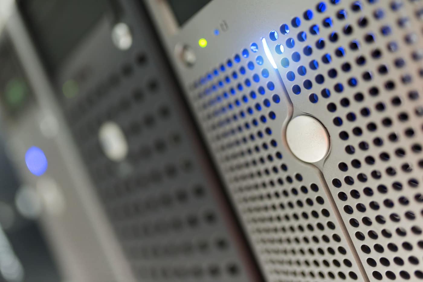 High-density server rack with illuminated equipment indicators