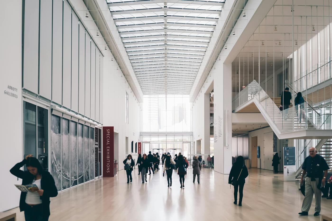 Bright institutional corridor with a continuous seamless hard floor
