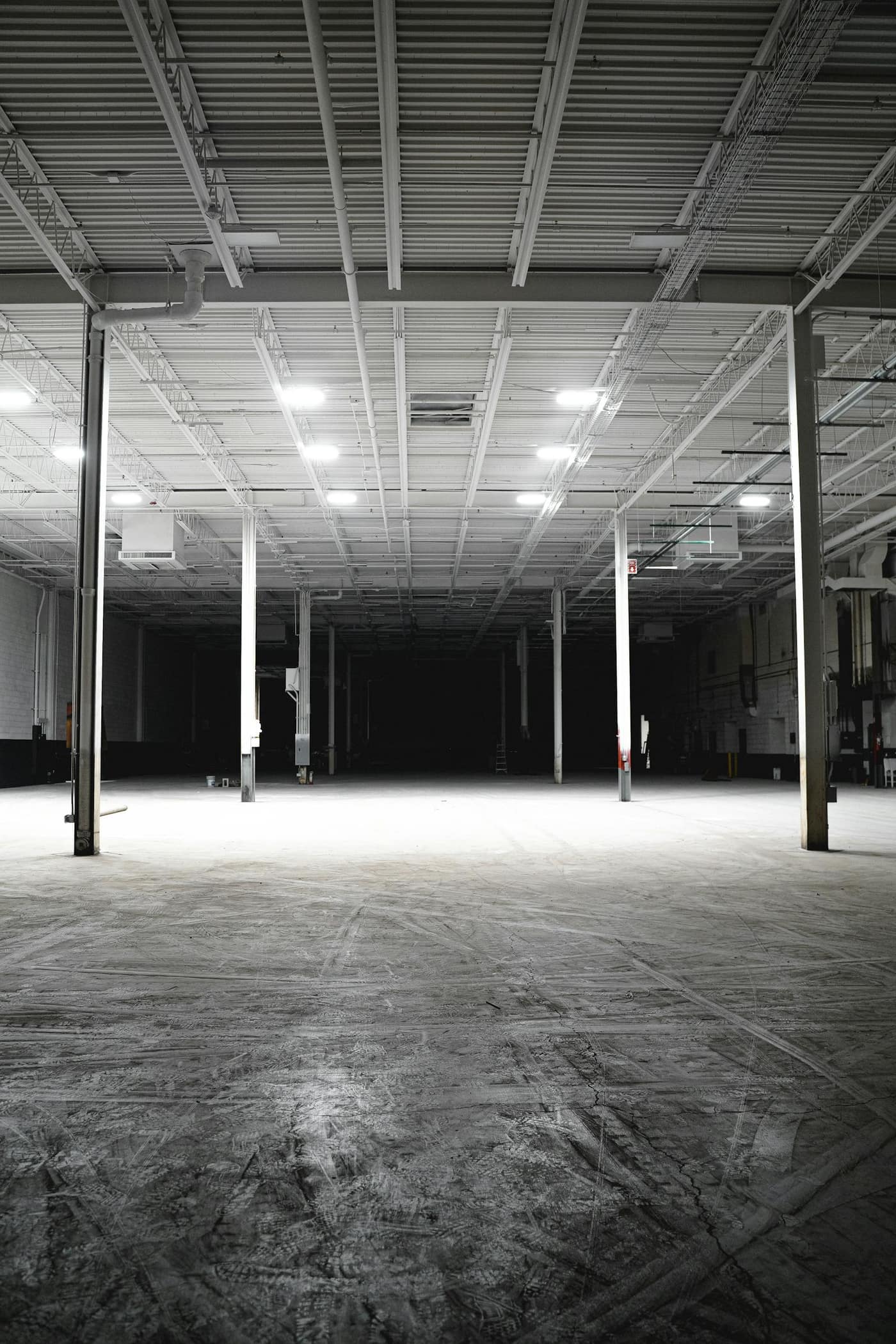 Polished concrete floor in an open industrial warehouse