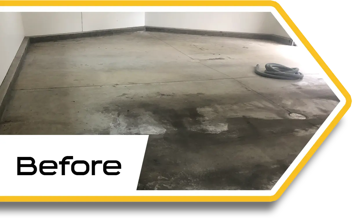 Cracked concrete floor before Jersey epoxy coating installation.